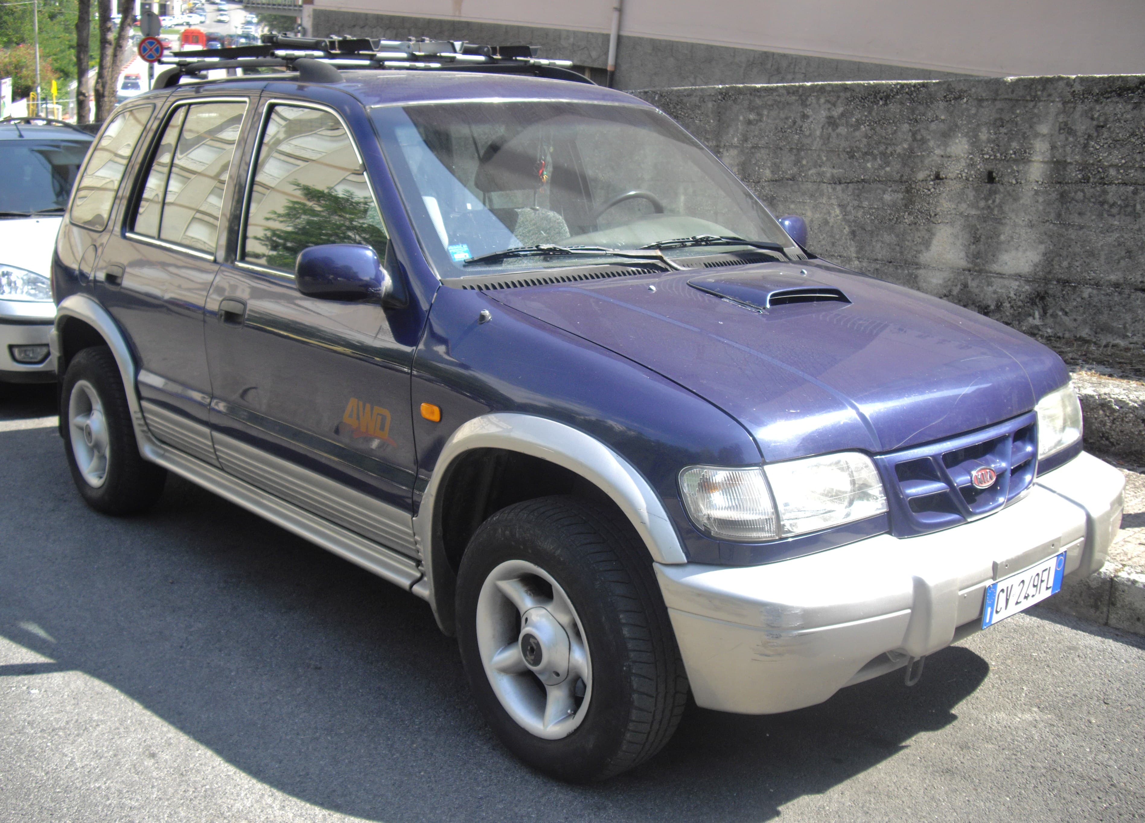 KIA Sportage — photo 1
